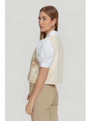 Chaleco beige bordado con lazada