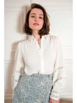 Blusa de gasa blanca