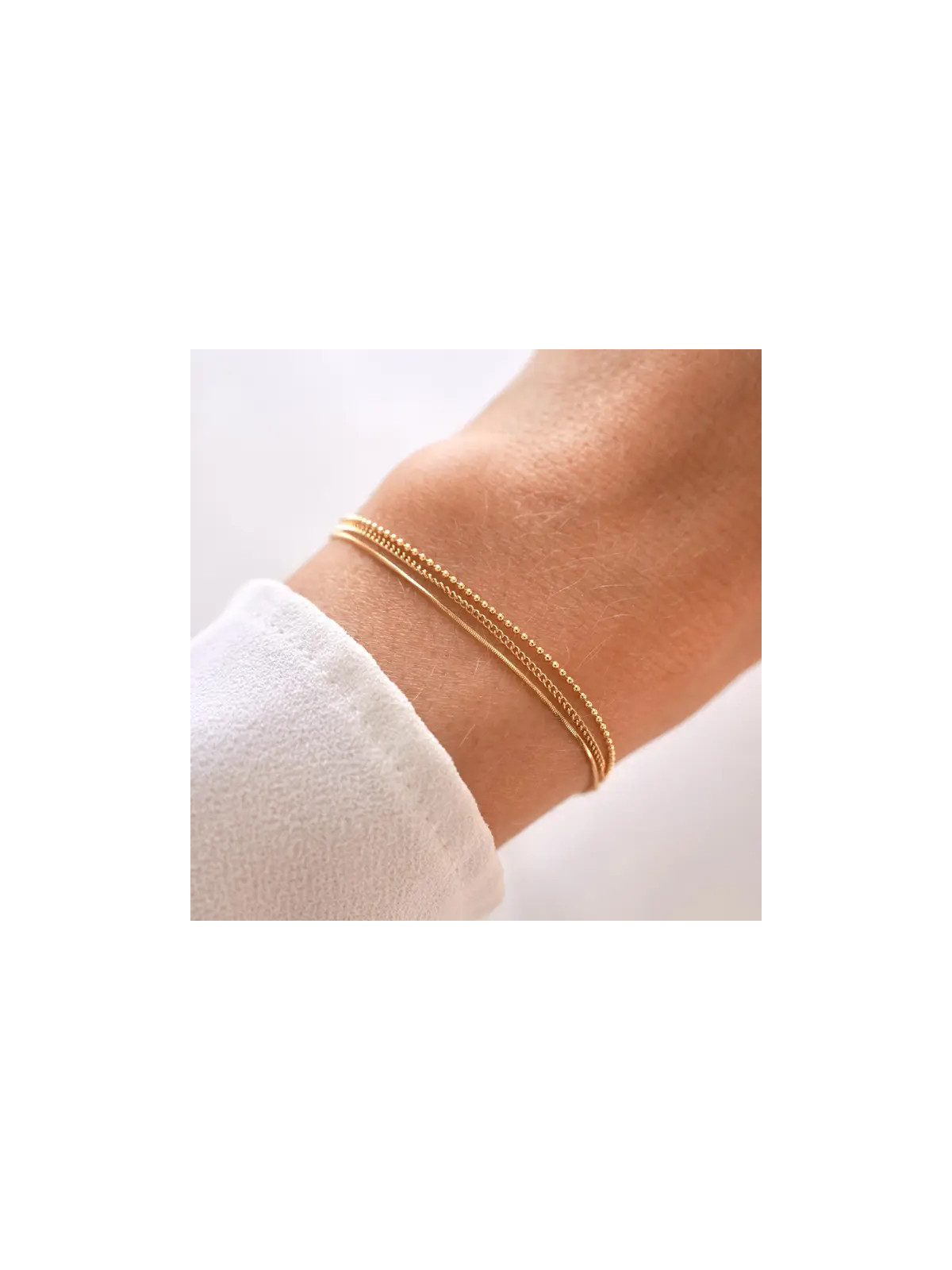 Pulsera con tres cadenas