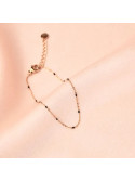 Pulsera con bolas negras